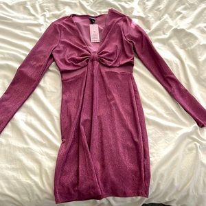 Sparkly pinkish purple long sleeved dress with side cut outs